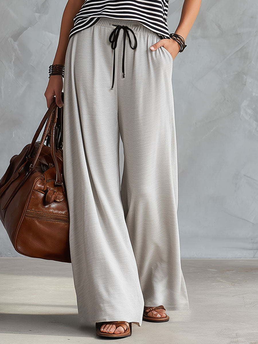 Sportliche graue Retro-Hose mit weitem Bein