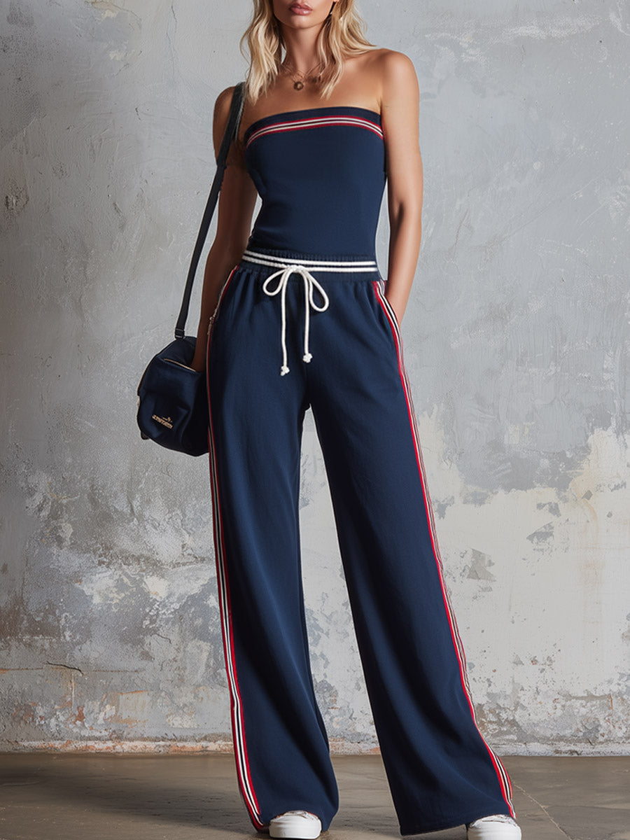 Retro-sportlicher schulterfreier Overall aus marineblauer Baumwolle mit gestreiftem Besatz