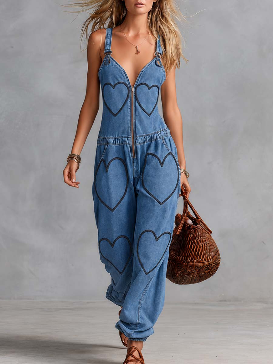 Lässiger blauer Denim-Jumpsuit mit V-Ausschnitt, Frontreißverschluss und Herz-Stickerei