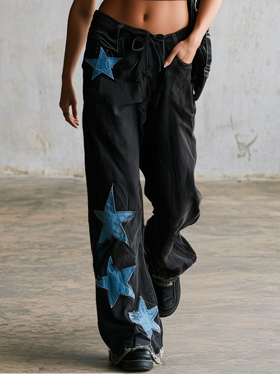 Lässige, auffällige schwarze Straight-Leg-Jeans mit Sternenmuster im Sportswear-Stil