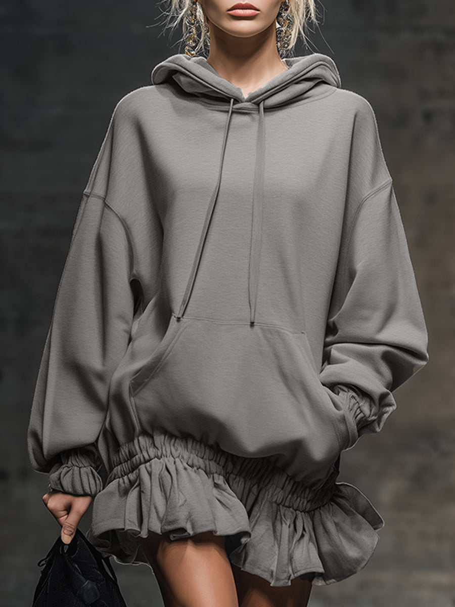 Lässiges und modisches graues Sweatshirt-Minikleid mit Kapuze und elastischem Saum