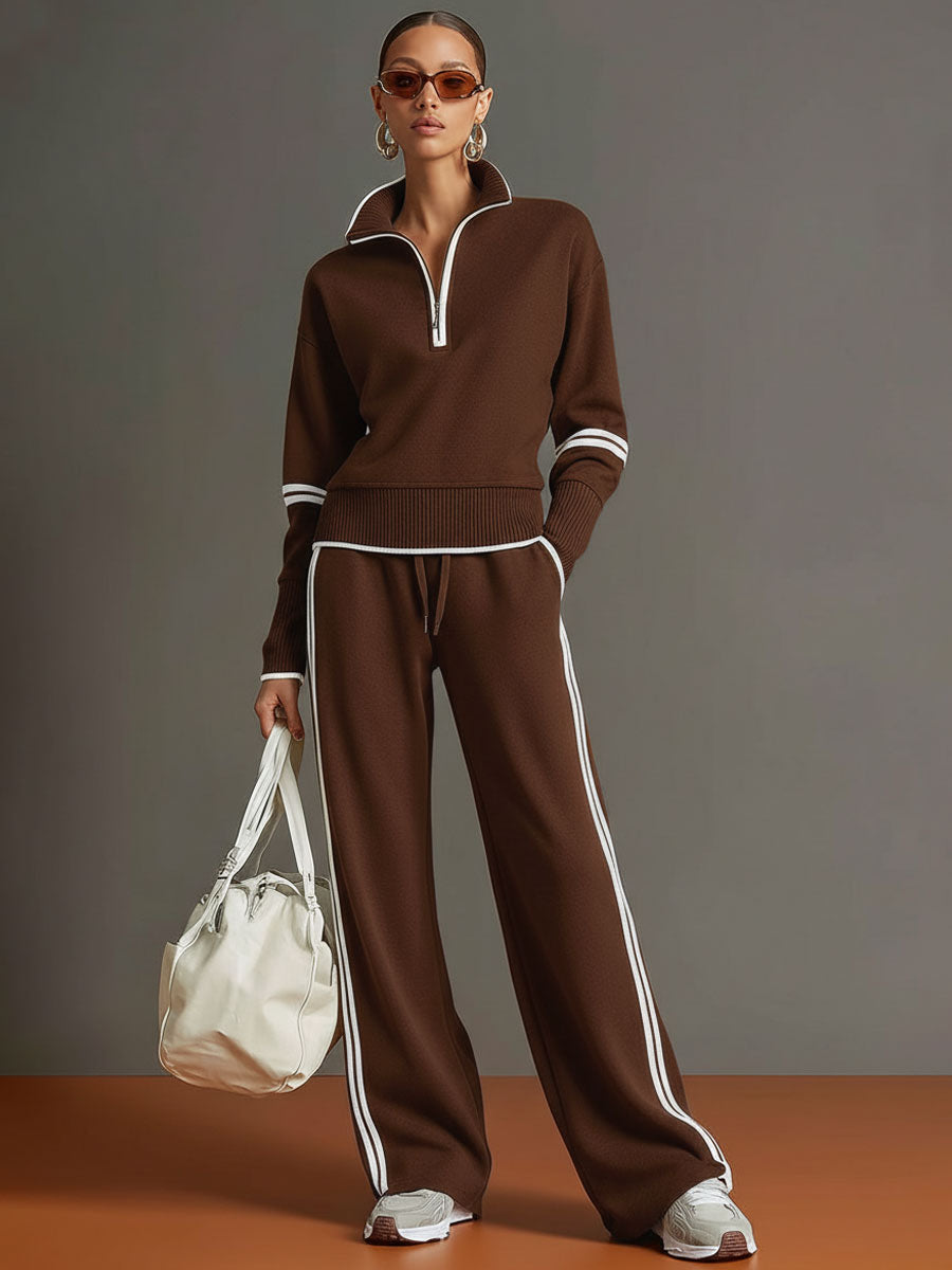 Retro-sportliches Set: Grau-weißes Sweatshirt mit Ripsband und halbem Reißverschluss und weit geschnittene Hose
