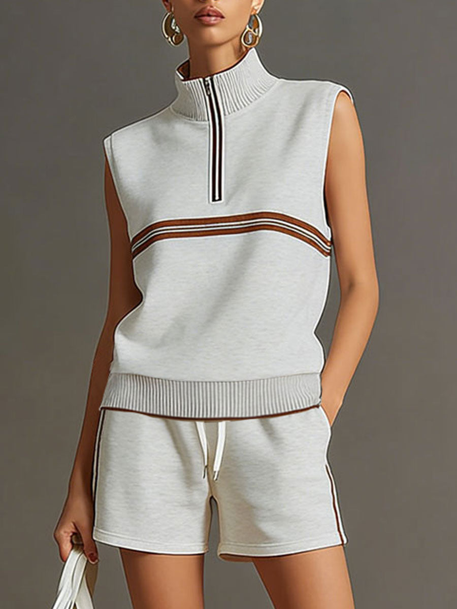 Retro-sportliches Set: Ärmelloses Sweatshirt mit halbem Reißverschluss und Shorts in Grau-Weiß