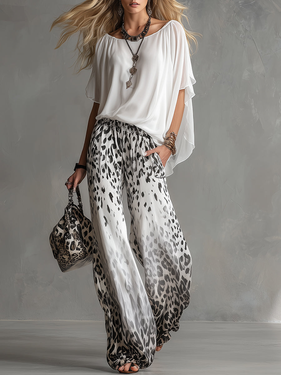 Modernes und stylisches Set: Weißes T-Shirt und Chiffonhose mit Leopardenmuster