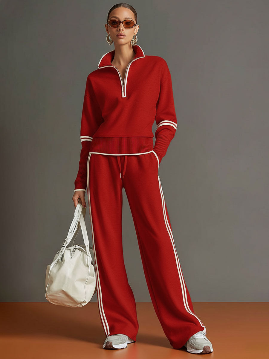 Retro-sportliches Set: Grau-weißes Sweatshirt mit Ripsband und halbem Reißverschluss und weit geschnittene Hose