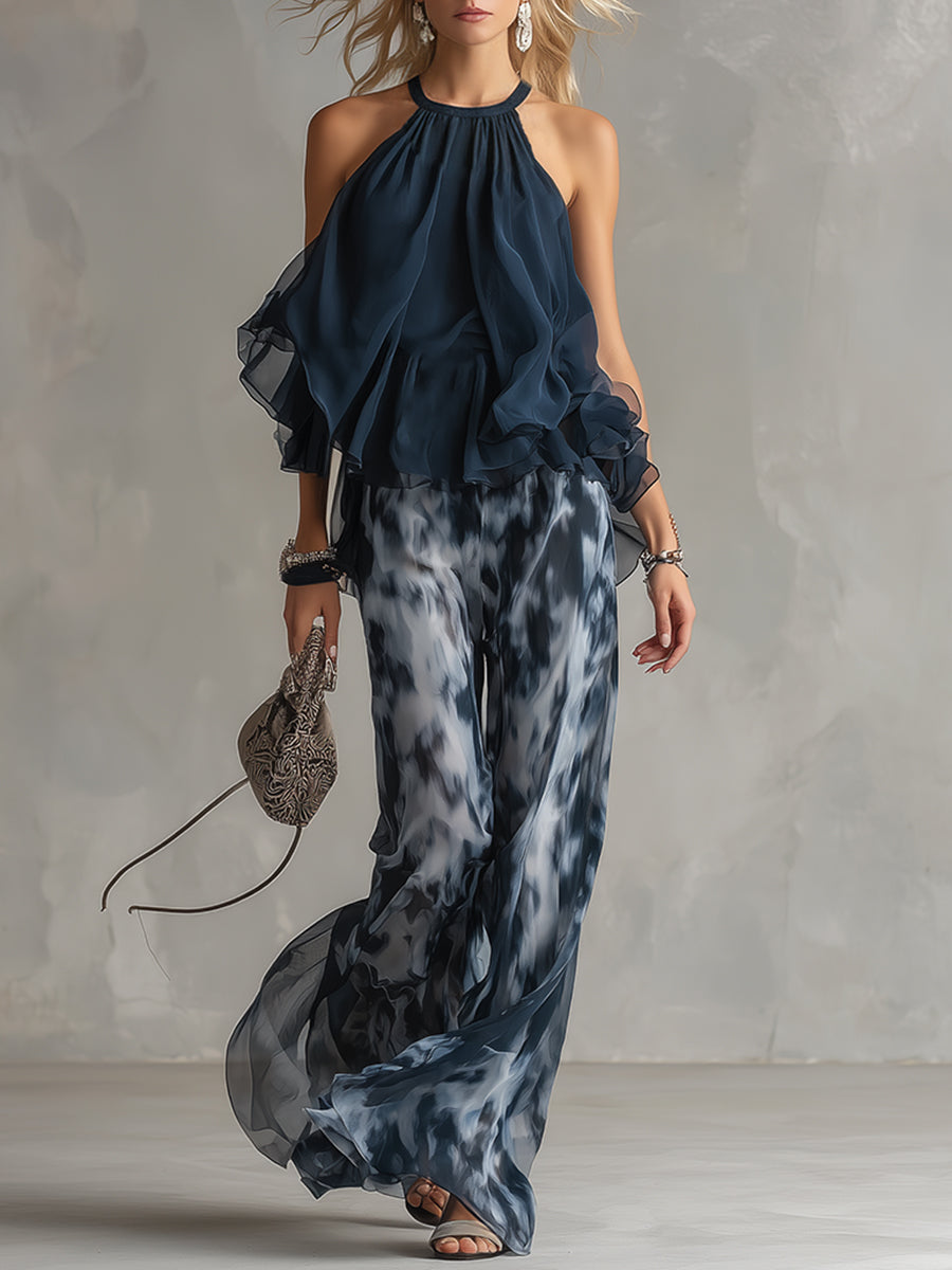 Elegantes urbanes Chiffon-Set: Marineblaues Neckholder-Top und weit geschnittene Hose mit Print
